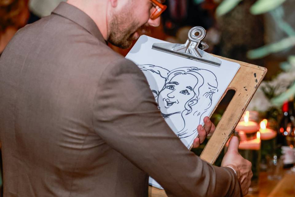 artist making sketches in dining area