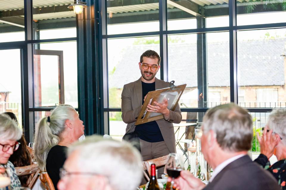 artist making sketches near guests