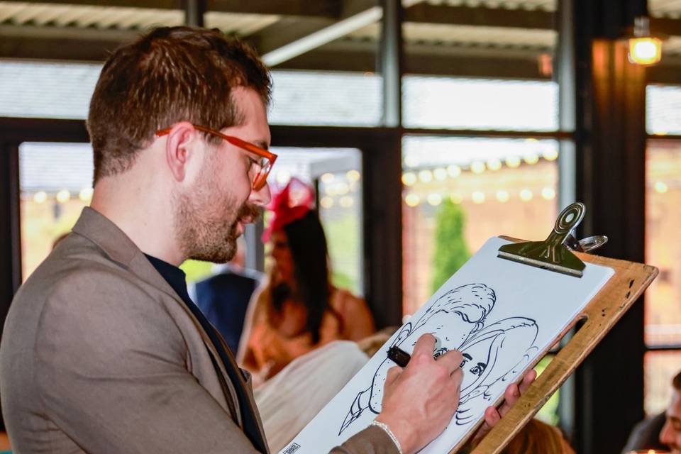 artist sketching in a banquet_hall