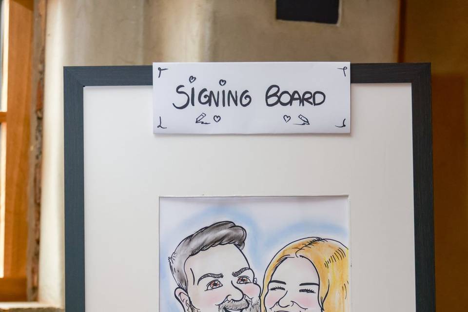 finished caricature on an easel
