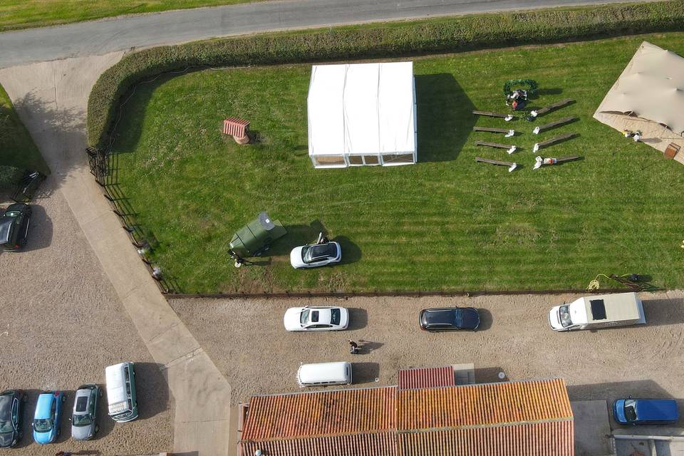 Aerial view of paddock, marquee and teepees