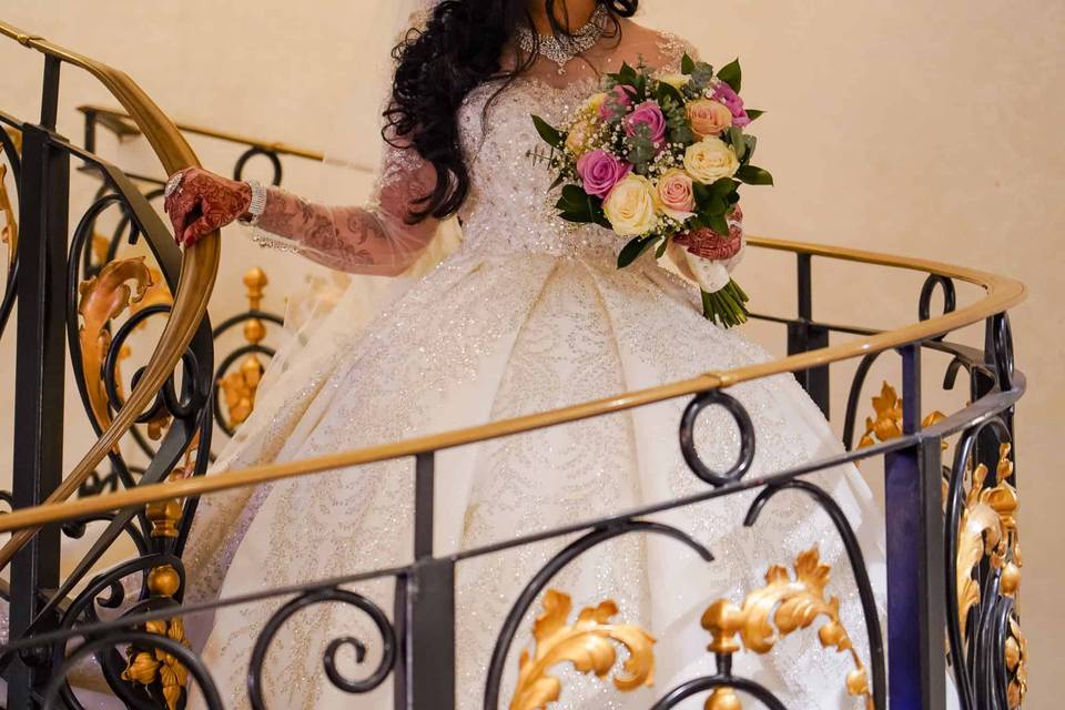 Bride coming down the stairs