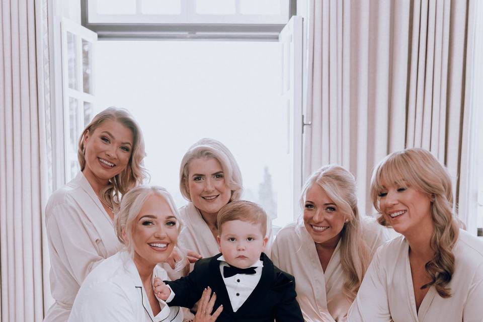 Child with bridesmaids