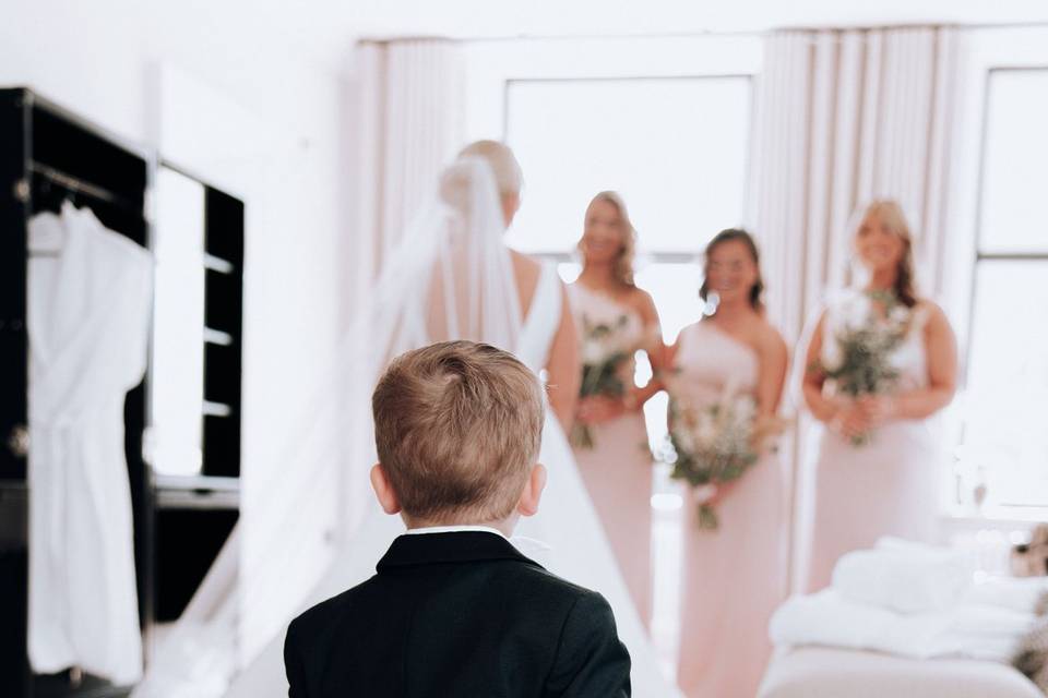 Child looking at Bridal party