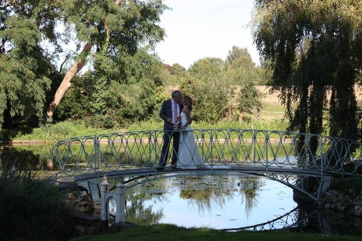 Ornate Regency style bridge over lake to Juliana's Island.