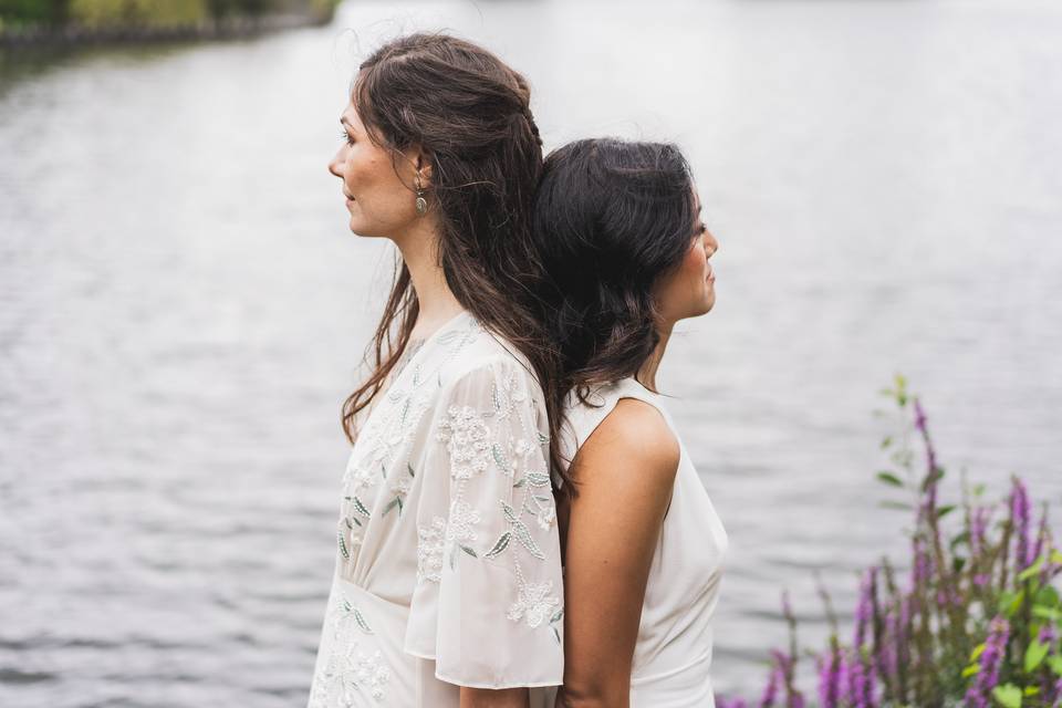 Two brides by the lake