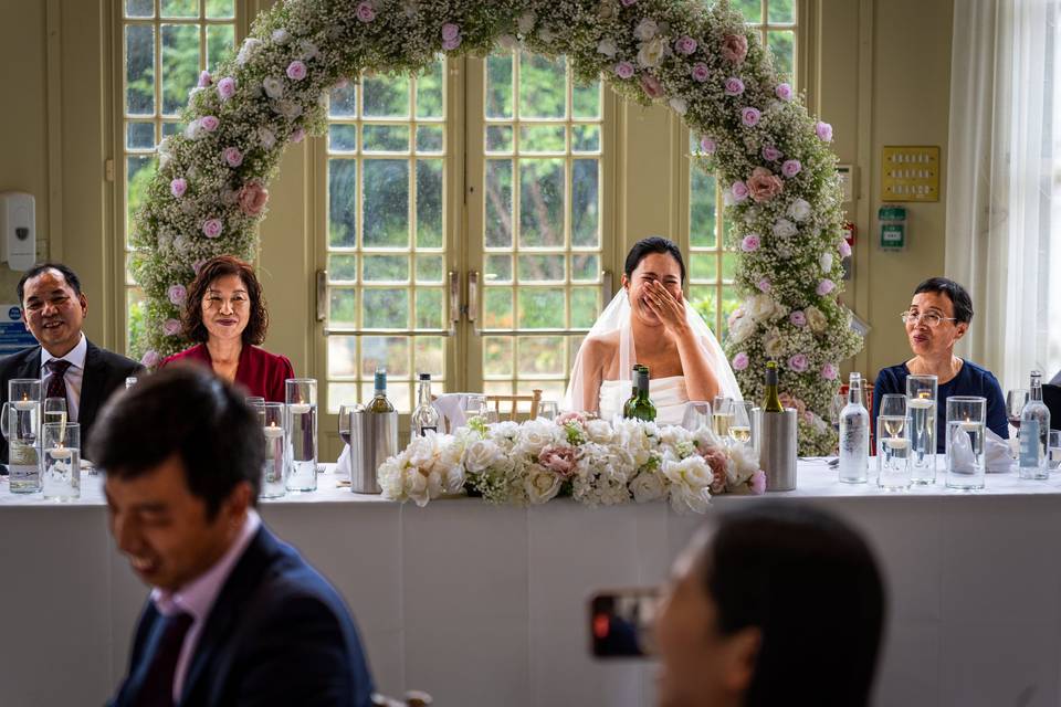 Bride Giggles at Grooms Speech
