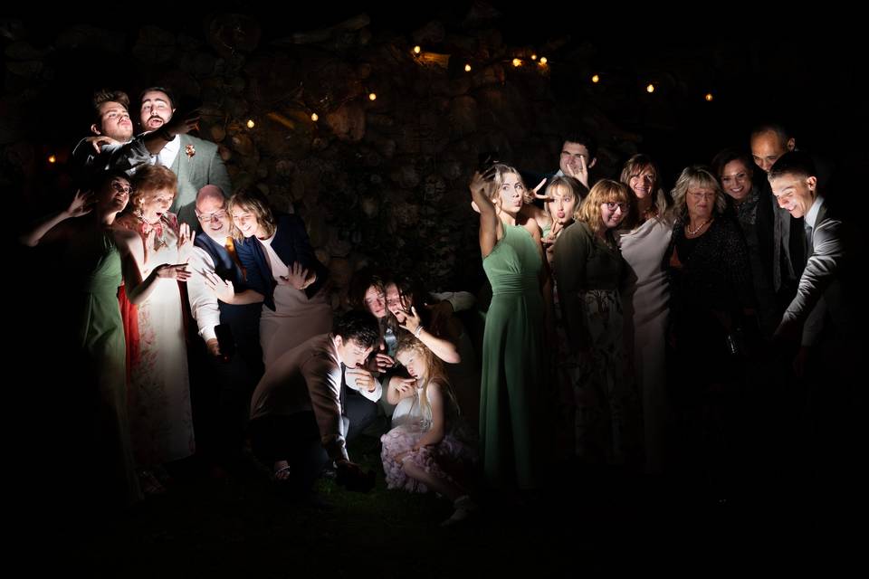 Guests and wedding party at night