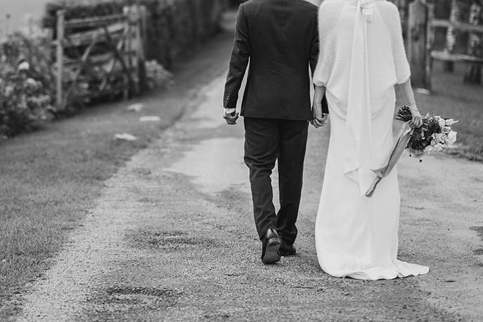 Black & white bride walking