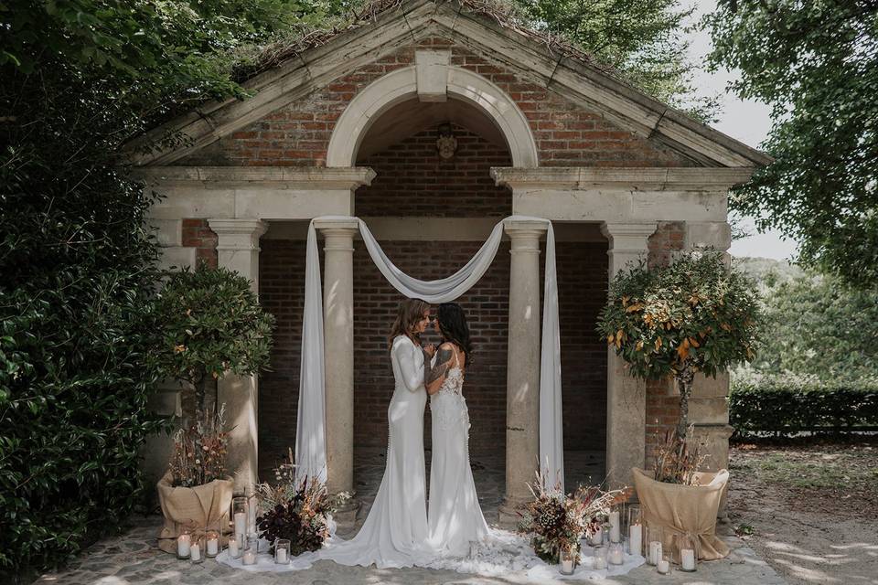 Drapes and candle arch