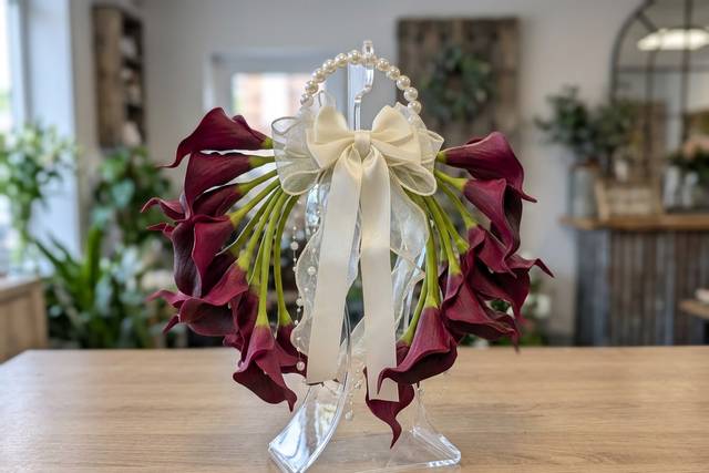 Tori burgundy calla lily bouquet with ivory ribbon