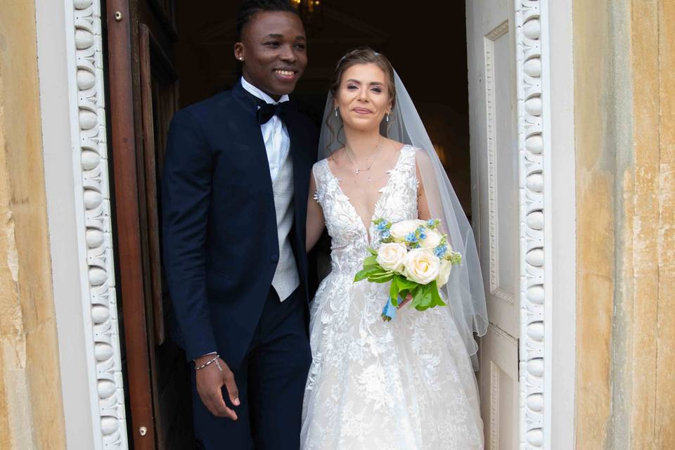 The bride and groom leaving