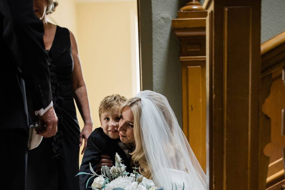 Emotional hug with bride & son