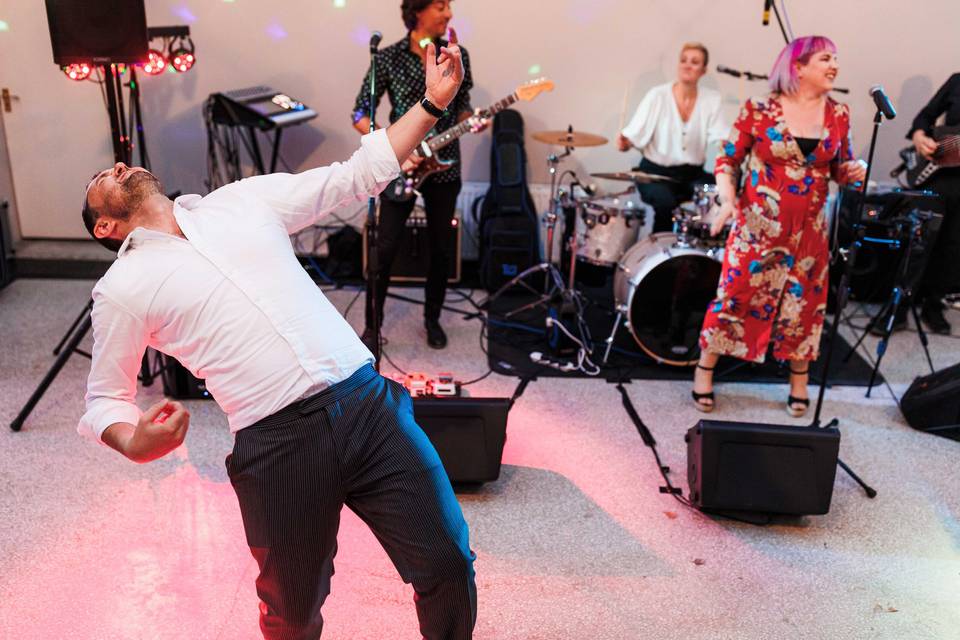 Groom's air guitar