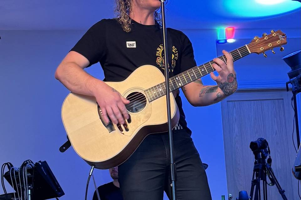 Acoustic guitar and singing