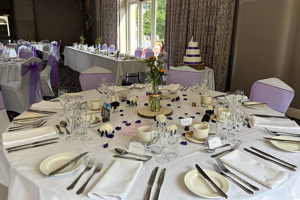 Purple and white table setting