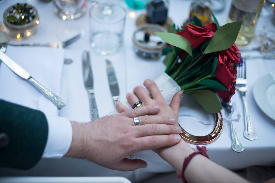 Holding hands at the table