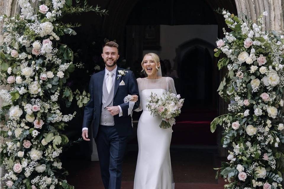 Bride and Groom church arch