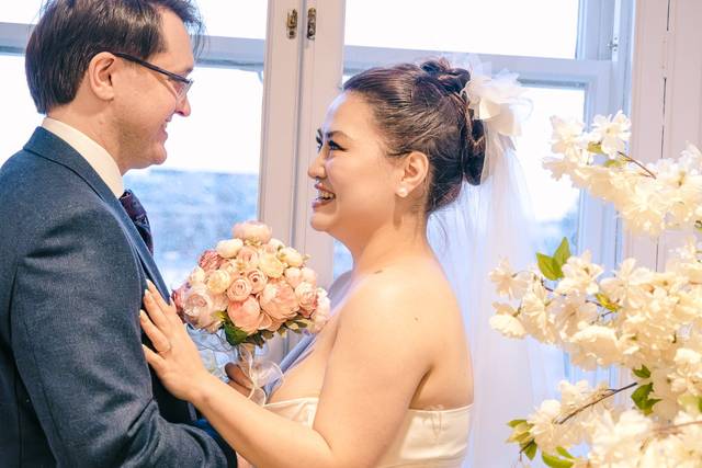 Husband and wife smiling