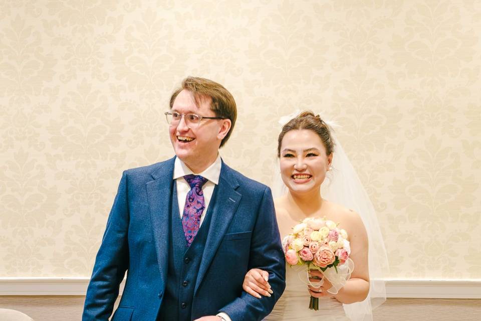 Bride and groom smiling
