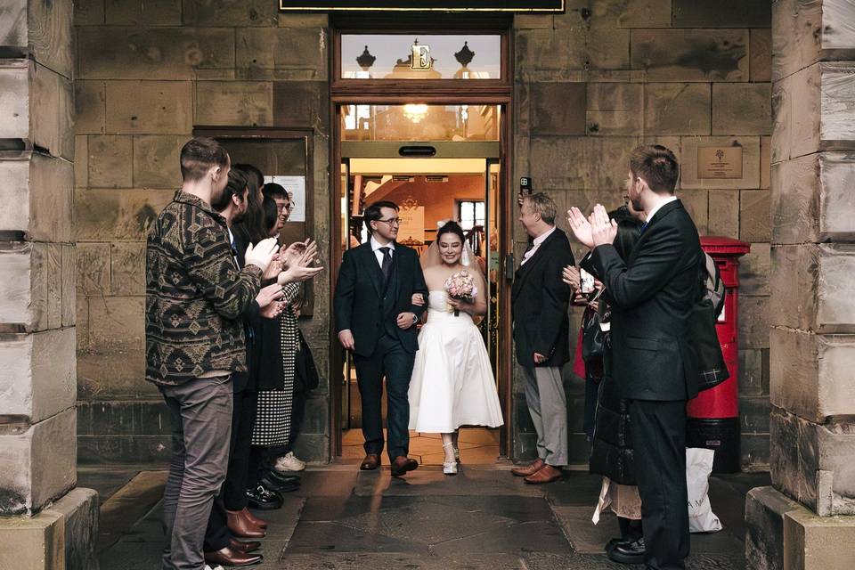 Wedding party leaving venue