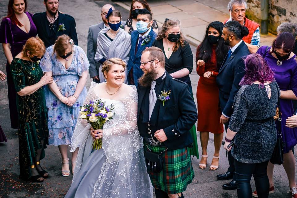Bride and groom  with guests