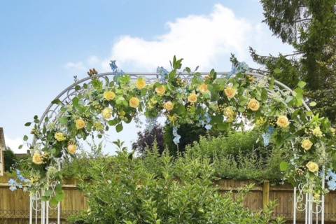 White arch with flowers