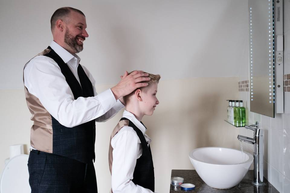 Groom and son getting ready