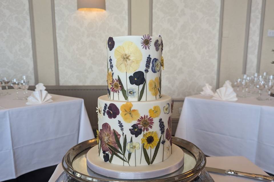 Pressed flower wedding cake