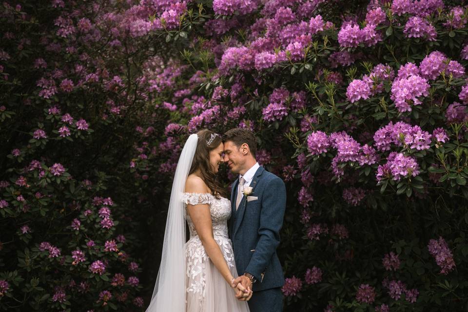 Bride, groom and flowers