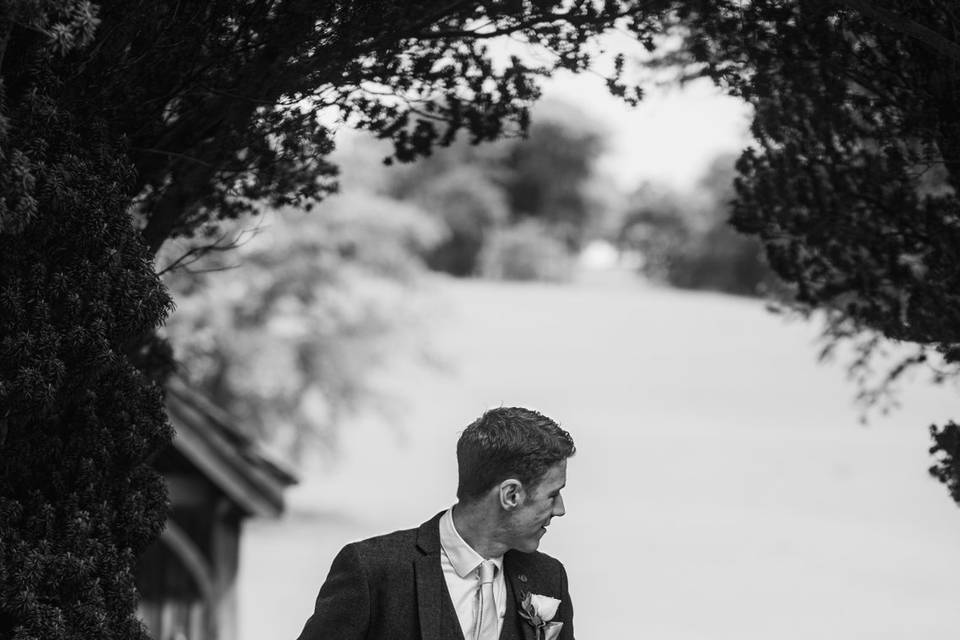 Groom walking to church