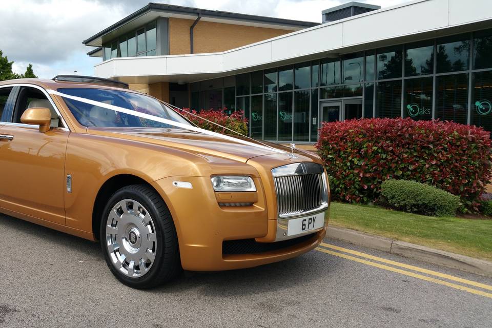 Gold Rolls Royce Ghost