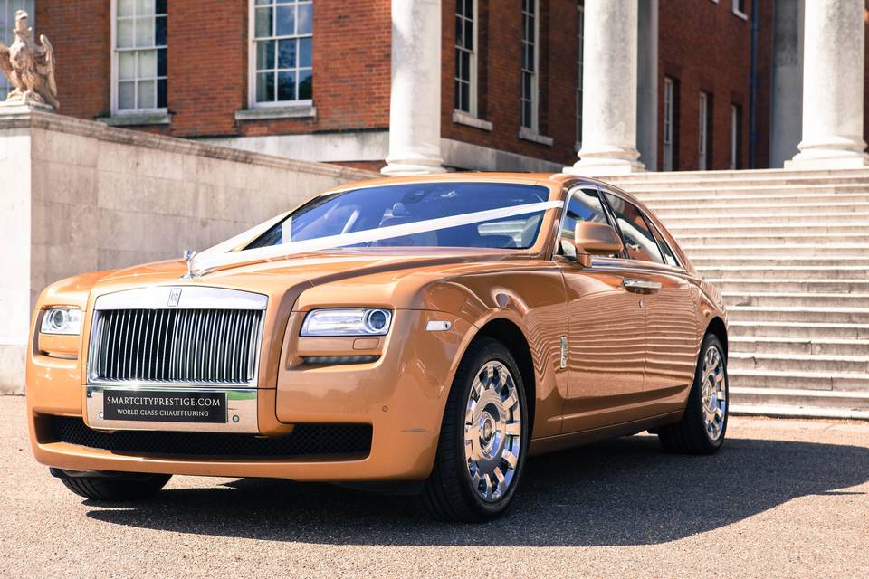 Gold Rolls Royce Ghost