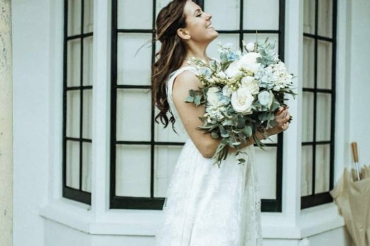 Holding her bouquet