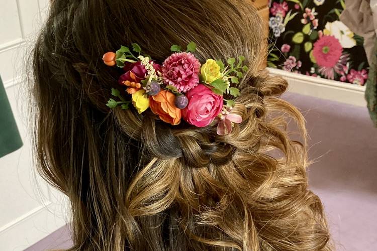 Guest-of-honour - floral accessory and beautiful curls