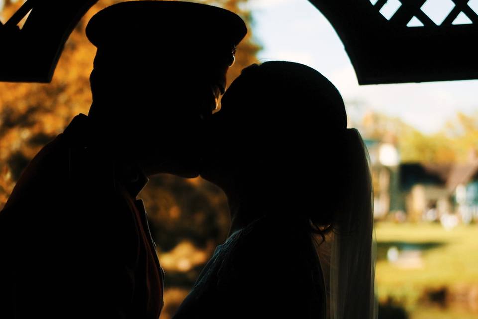 Silhouette kiss by the lake