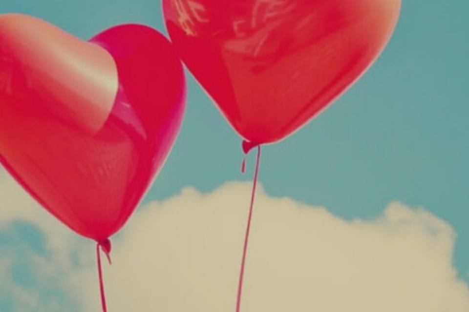 Two red heart balloons