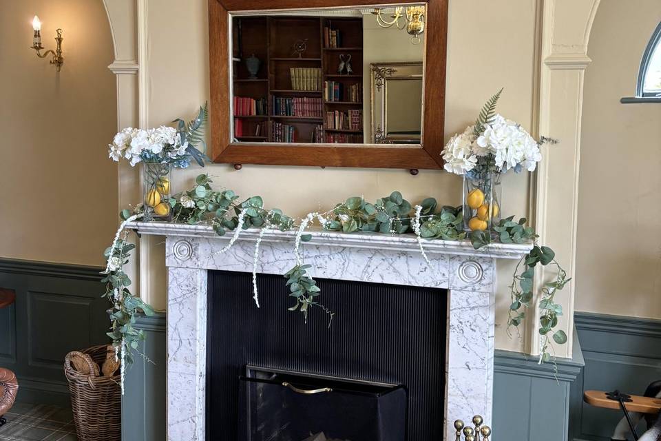 Fireplace with lemon vases