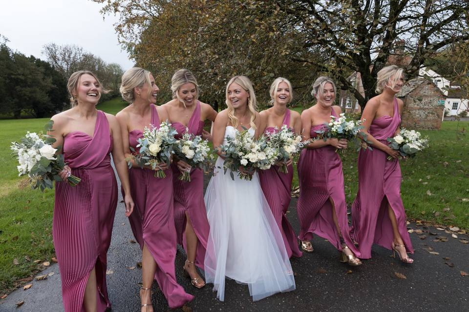 Wedding party holding bouquets