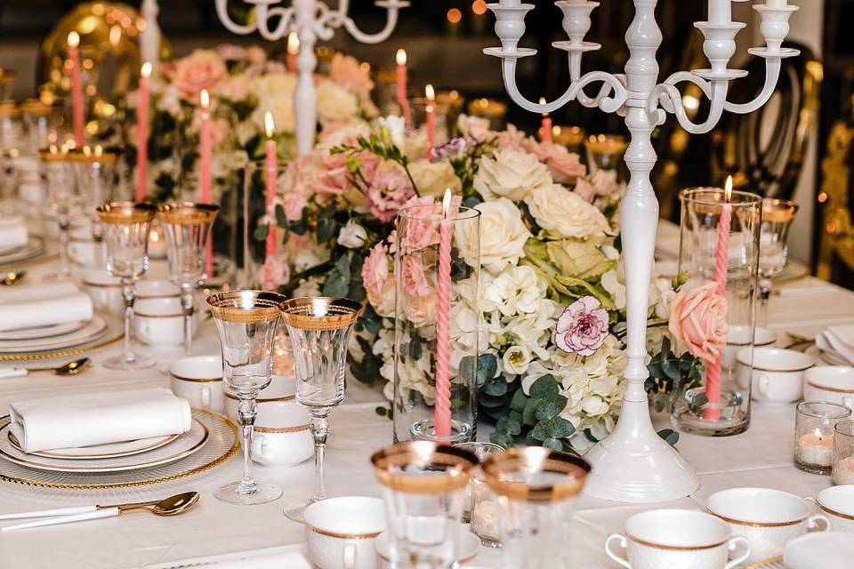 White Candelabras and Flower