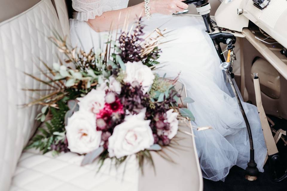 Bride and wedding car