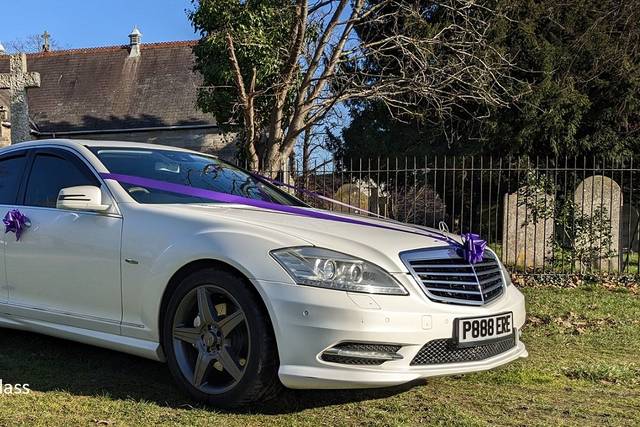 White Mercedes S class saloon