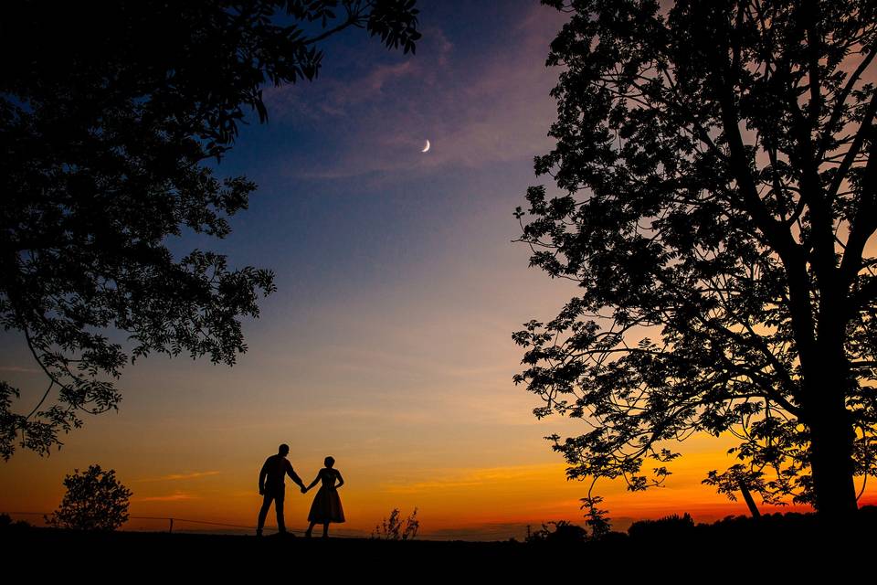 Holding hands at sunset - SMH Photography