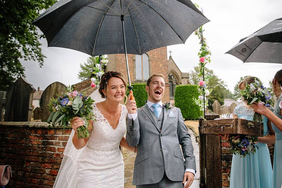 Newlyweds on a bridge - SMH Photography