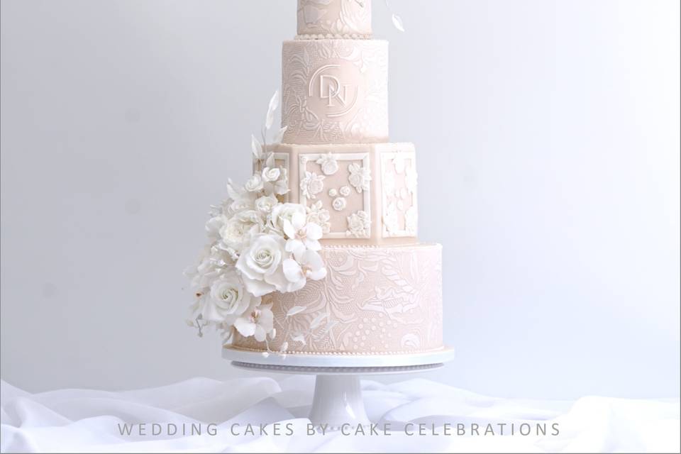 Nude and white wedding cake