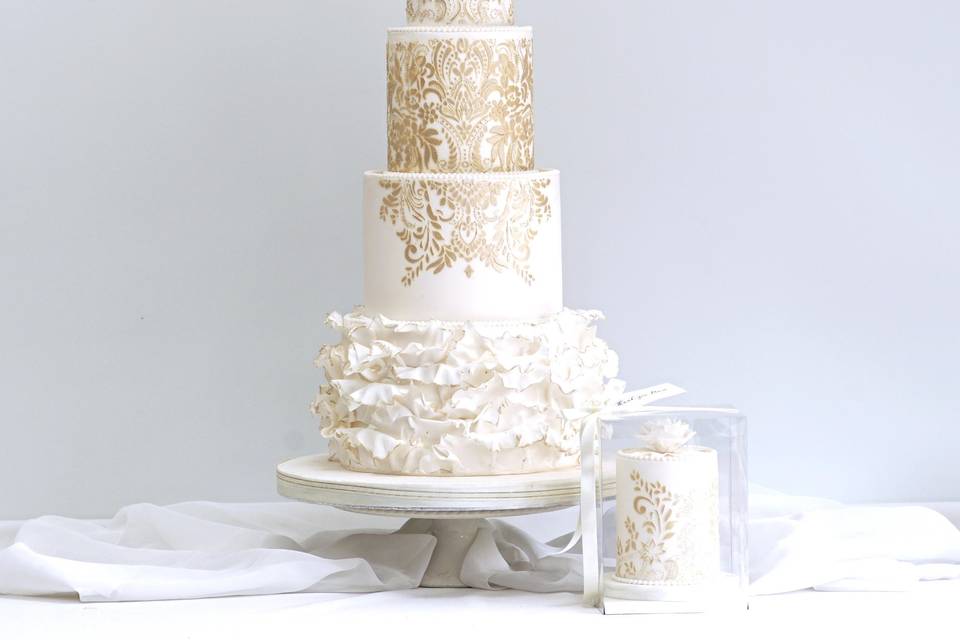 White and gold wedding cake