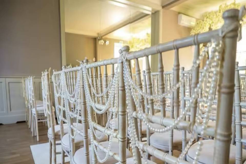Chair pearl drapes