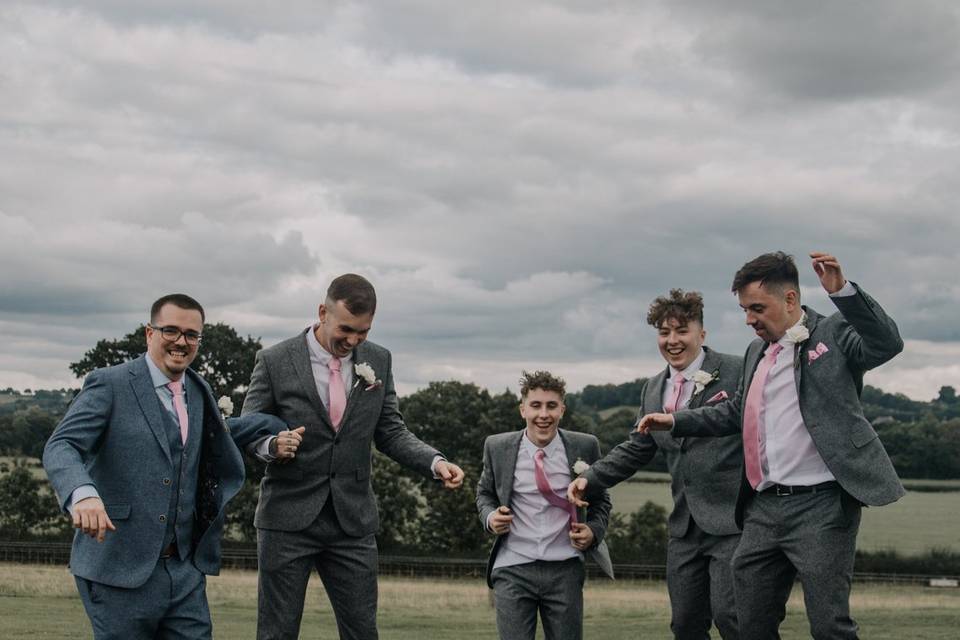 Groomsmen on a trampoline