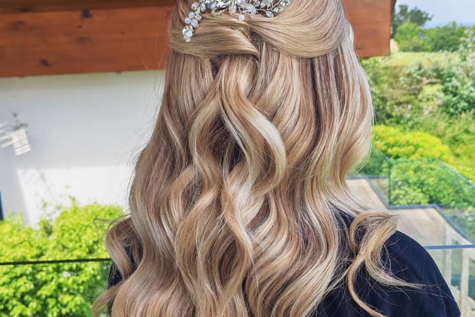 Half-up half-down hairstyle