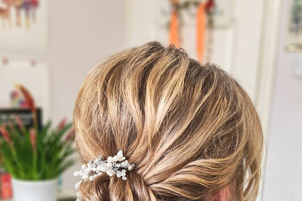 Low loose hairstyle